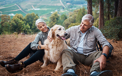 Buy stock photo Dog petting, hiking and a couple in nature for travel, relaxation and break on a mountain. Happy, relax and an elderly man and woman with an animal on a walk in the mountains and resting together