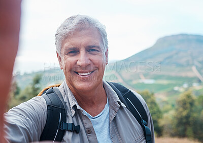 Buy stock photo Selfie, hiking and portrait of old man on mountain for outdoor adventure, freedom and wellness in nature. Retirement, traveling and happy senior male take picture on hike, trekking and summer holiday