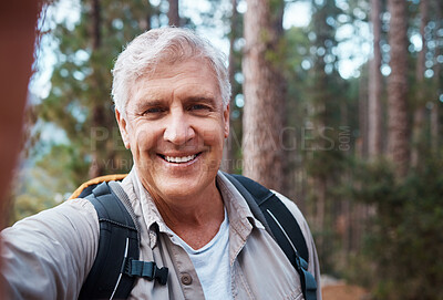 Buy stock photo Selfie portrait, forest and senior man hiking, fitness and outdoor health with happy blog update for social media. Nature, travel and trekking of mature person in woods with profile picture post