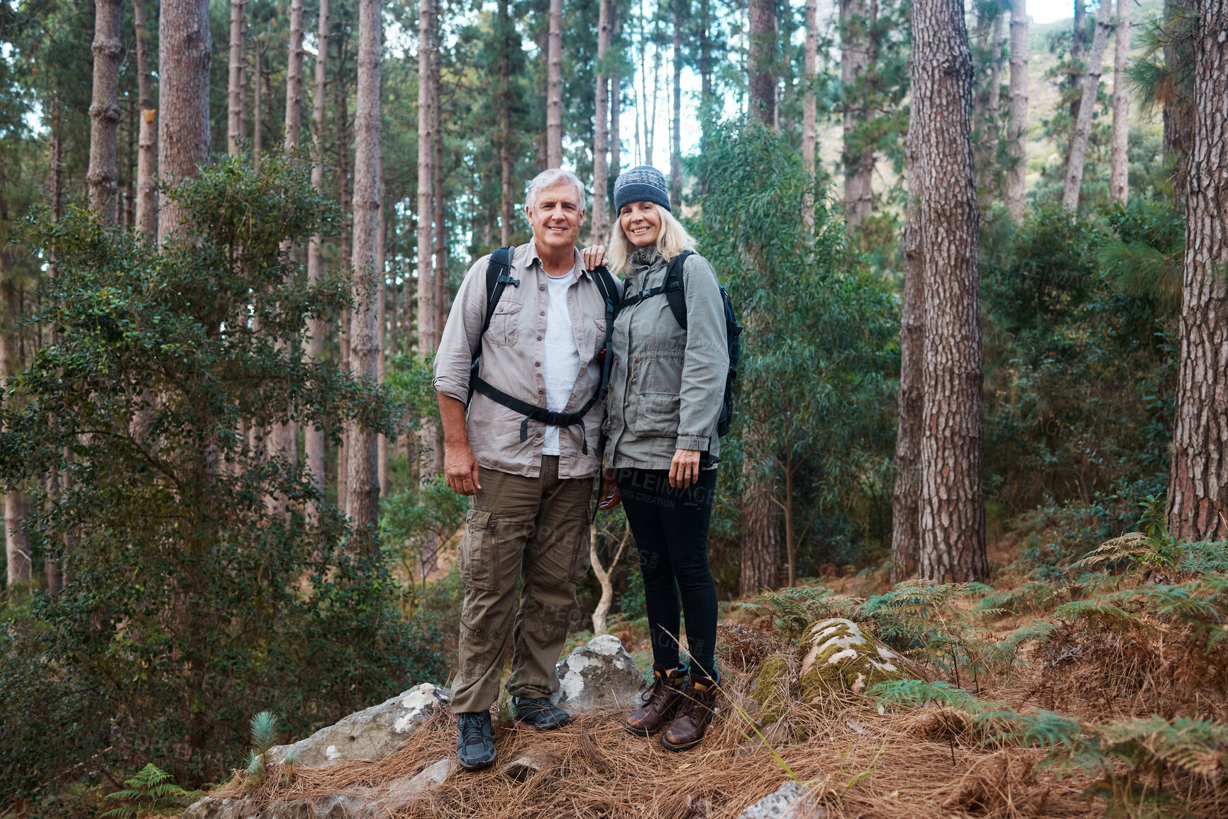 Buy stock photo Nature, retirement and hiking, portrait of old couple standing in forest in mountain of Peru on holiday adventure. Travel, senior man and and mature woman trekking on hike with love, smile and health