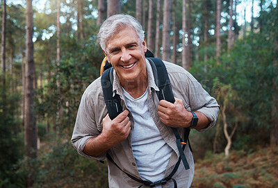 Buy stock photo Happy, hiking and portrait of old man in nature for relax, trekking and adventure. Travel, wellness and vacation with senior male walking in forest for retirement, backpacking and cardio endurance