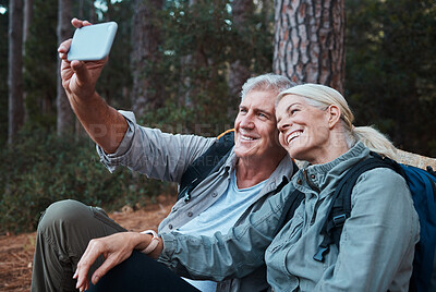 Buy stock photo Senior couple, selfie and hiking in forest, happy people in nature with memory and social media post. Smile in picture, adventure and fitness, old man and woman with active lifestyle and outdoor