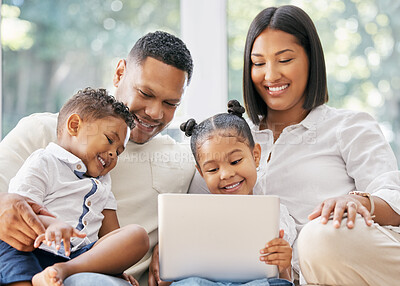 Buy stock photo Shot of a family using a tablet at home