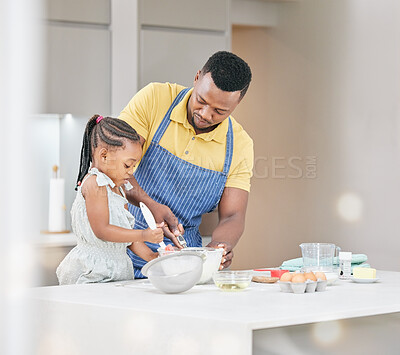 Buy stock photo Black family, father and child baking together at kitchen counter for help and love. African man or dad and girl kid in house to learn focus and cooking food, dessert and pancakes for development