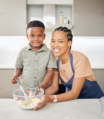 Buy stock photo Mother, son and happy baking portrait at kitchen counter with help and love. Black woman or mom and child together in family home to learn about cooking food, dessert and pancakes for development