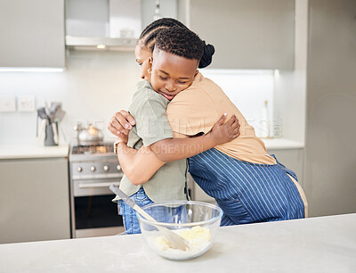Buy stock photo Hug, child and mother baking together at kitchen counter for help and love in family home. Black woman or mom and happy kid or son learning about cooking food, dessert and pancakes for mothers day