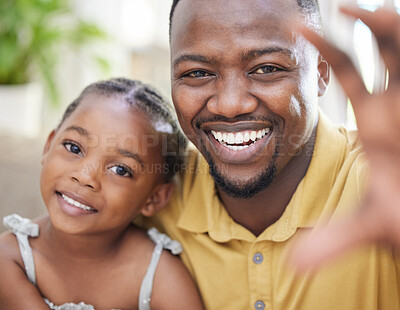 Buy stock photo Portrait, black father and girl take selfie, smile and bonding together in home. Face, photography and African dad with child taking profile picture for social media, happy memory and family care.
