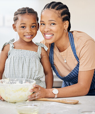 Buy stock photo Baking, family and portrait of a mother and child at kitchen counter for help and love. Face of black woman and happy kid in a house to learn about cooking food, dessert and pancakes for development