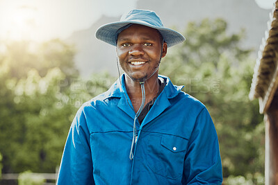 Buy stock photo Happy, portrait or black man with hat on farm for agriculture, conservation or natural production in nature. Young African, male person or farmer with smile for produce, crops or gardening in Nigeria