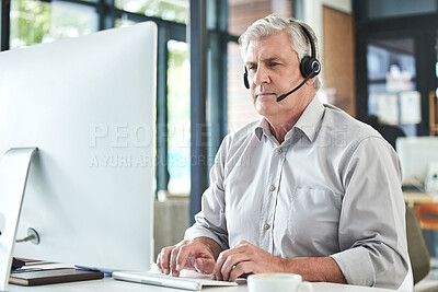 Buy stock photo Mature, contact us and call center writing of a professional at a computer for telemarketing job. Senior expert, web support and consultation of male person at desk for business and customer service.