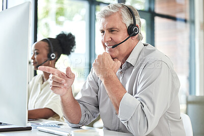 Buy stock photo Call center, customer support and senior man on computer for online help, advice and telemarketing. Communication, office and mature male worker point to screen for contact, crm service or consulting