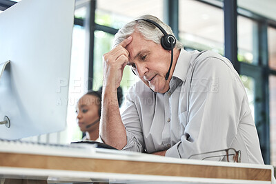 Buy stock photo Stress, callcenter manager and man with headache in customer service agency with pain or crisis. Communication fail, senior management with computer or help desk consultant with problem on phone call