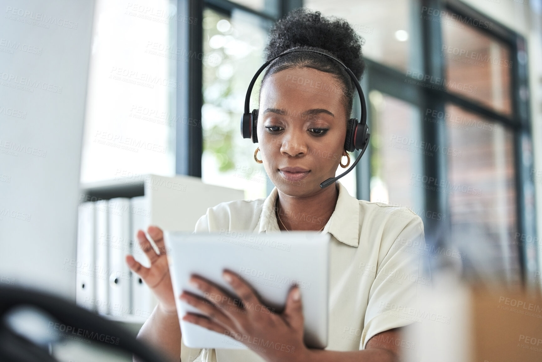 Buy stock photo Business woman, tablet and telemarketing work of a employee with web search at office. Contact us, call center and African female worker at a phone tech consultation company typing a online email 