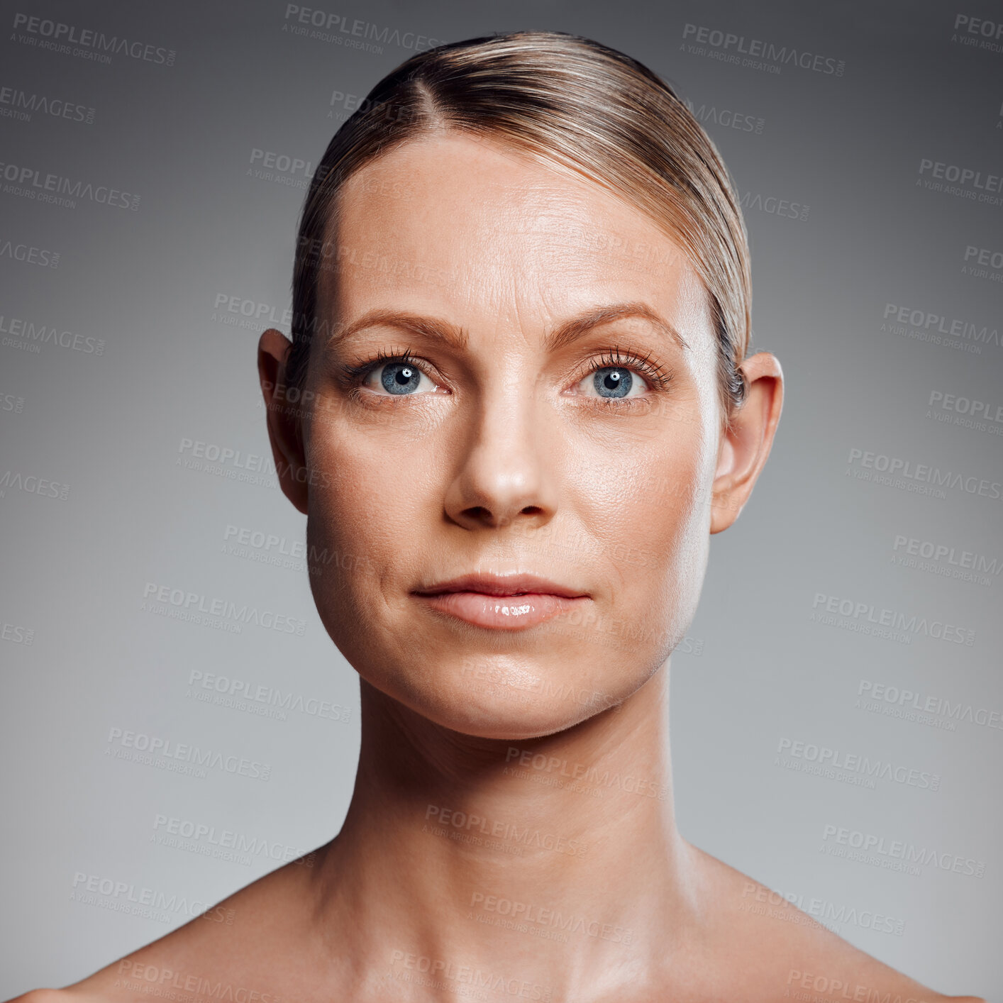 Buy stock photo Portrait, beauty and skincare of mature woman in studio for glow, results or serious on gray background. Face, confident and model in natural cosmetics for dermatology, anti aging or aesthetic at spa