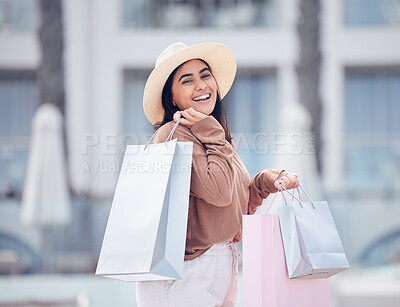 Buy stock photo Happy woman in portrait, shopping bag and retail at outdoor mall, smile with purchase, luxury and shop discount. Female customer, fashion designer brand and buyer choice with store promotion and sale