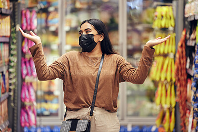 Buy stock photo Woman, face mask and grocery shopping with choice, decision or confused for market price increase or inflation. Customer or person in pandemic with why and question for food in supermarket or economy