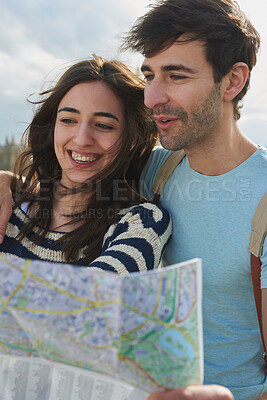 Buy stock photo Travel, map and vacation with a couple searching for directions while overseas or abroad on honeymoon. Love, navigation and sightseeing with a man and woman on the search for a tourist attraction