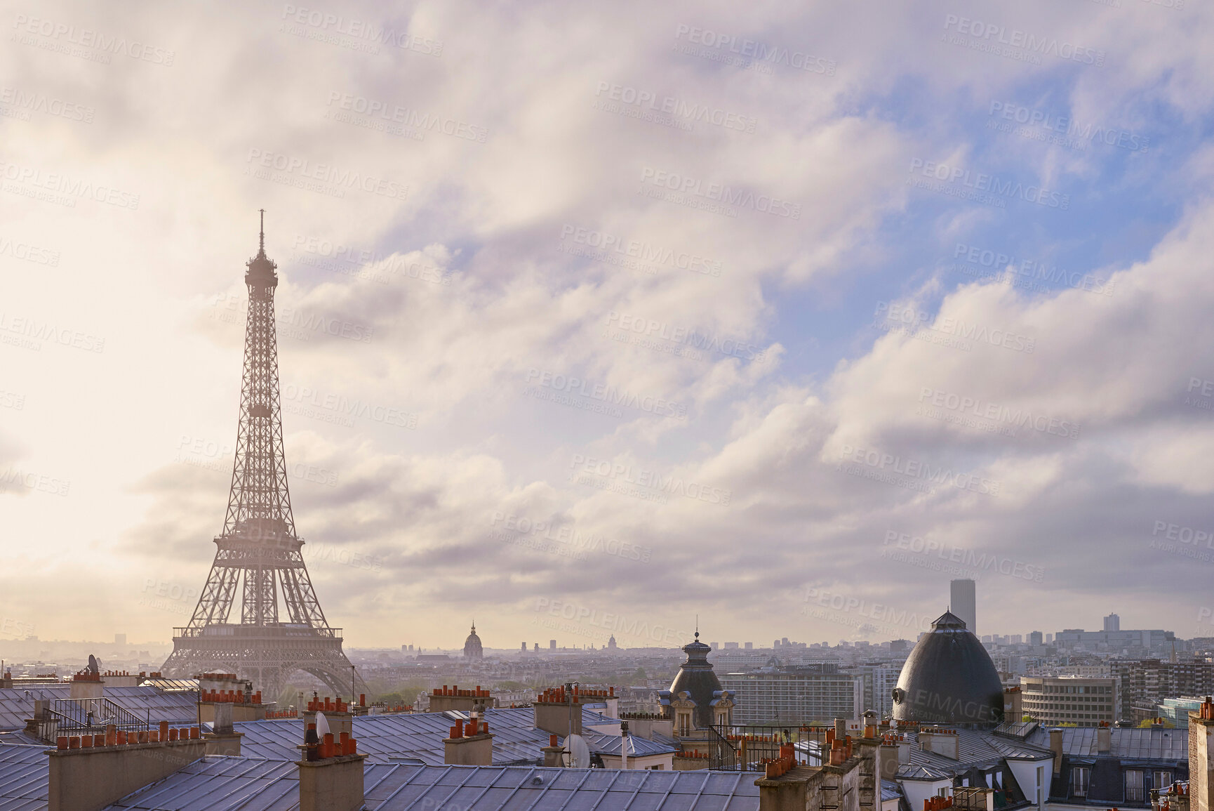 Buy stock photo City, skyline and Eiffel Tower at sunset with travel, cloudy sky and holiday location with urban architecture. Paris, vacation and rooftop of buildings with culture, cityscape and scenic evening view