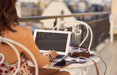 Buy stock photo City, laptop and woman on balcony in France for remote work, internet and international job. Research, morning and person typing on computer for tourism website on holiday, vacation and travel blog