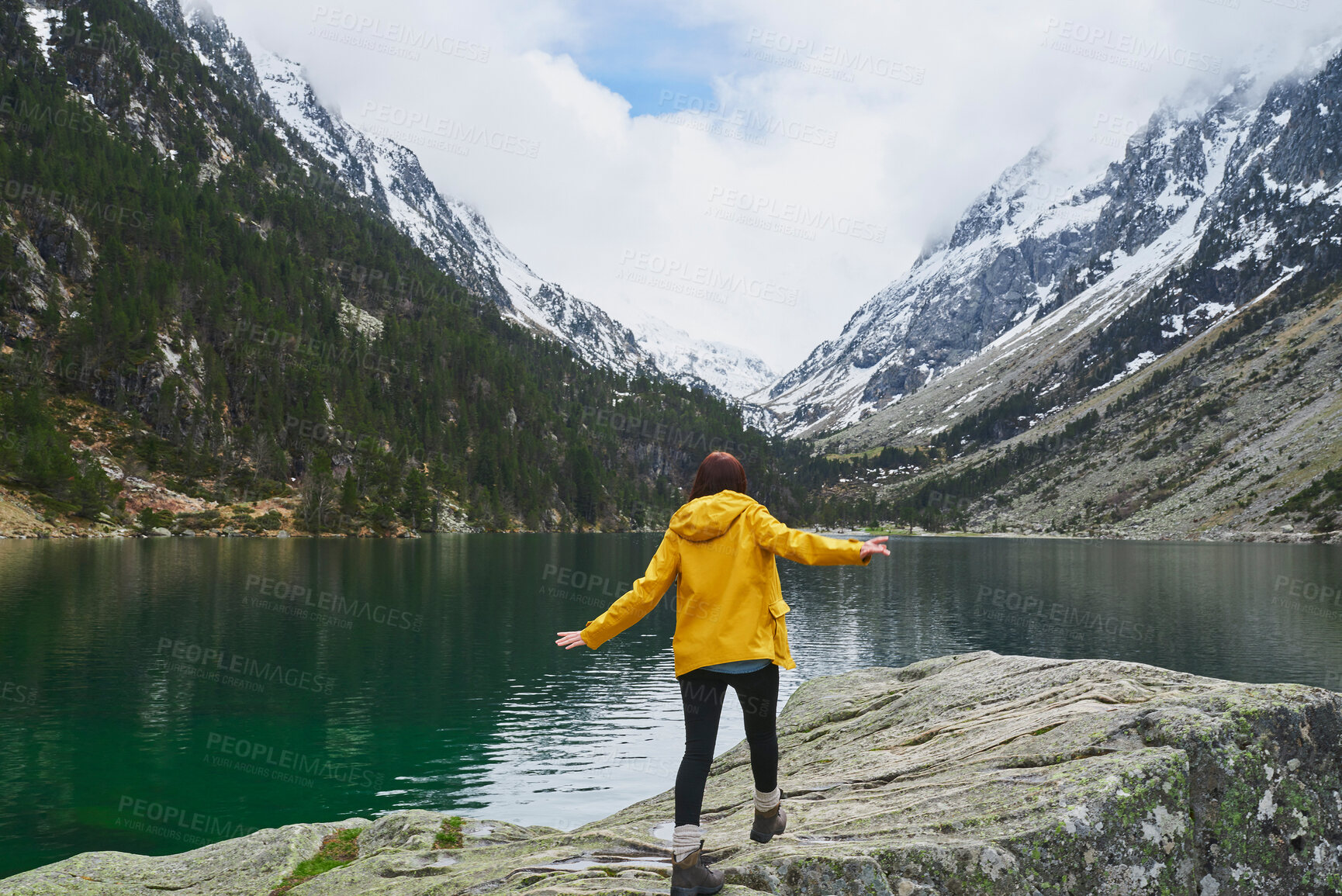 Buy stock photo Outdoor, walking and back of person, lake and view of scenery, adventure and tourist in winter and mountain. Water, snow and vacation in nature, travel and tourism in environment, forest and Canada