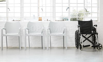 Buy stock photo Diversity, inclusive and a row of white chairs with a black wheelchair in a waiting room in the hospital. Different empty seats in inside a lobby of a clinic or office corridor
