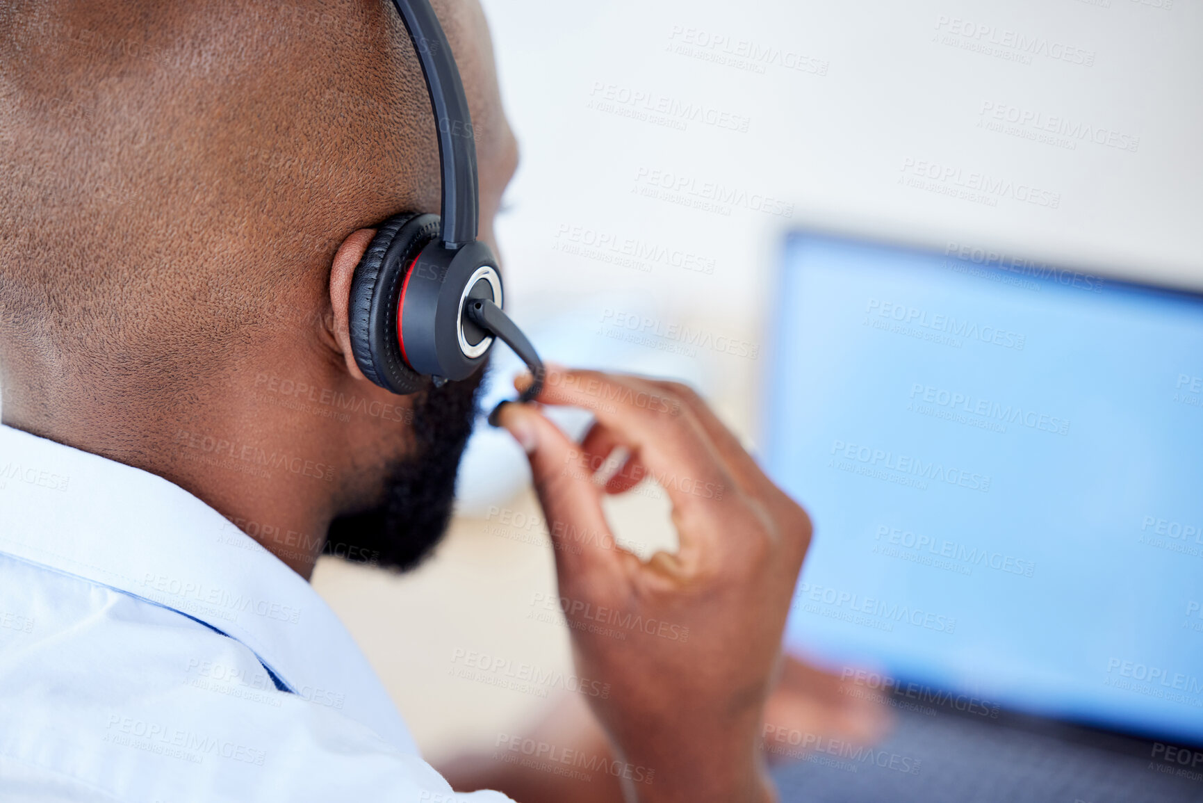 Buy stock photo Consultant, back view of black man with headset and laptop at his desk for support. Telemarketing or customer service, online communication or networking and African male call center agent at work