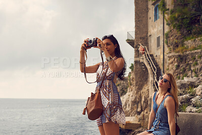 Buy stock photo Travel, tourism or tourist friends taking a picture on holiday, vacation or weekend trip for memory. Photography, view or women with camera abroad for sightseeing in Italy on fun adventure journey 
