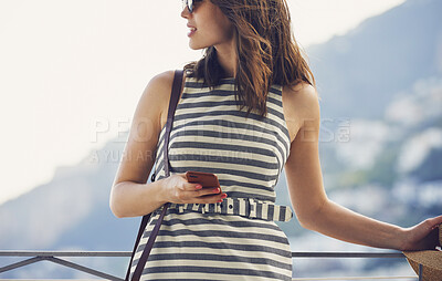 Buy stock photo Beautiful woman using smartphone at luxury hotel on vacation to communicate on social media