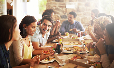 Buy stock photo Cropped shot of a group of friends enjoying pizza together