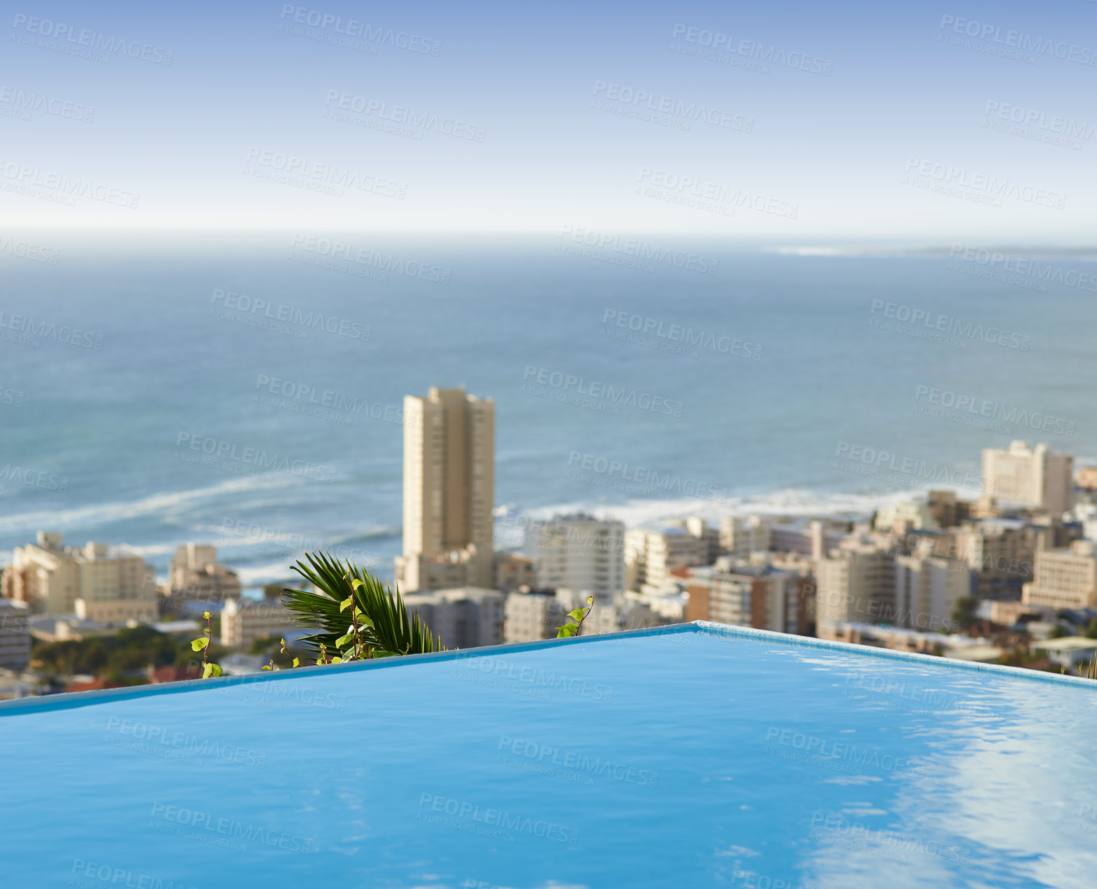 Buy stock photo Travel, vacation and pool in city with ocean and hotel view in Cape Town with nobody, buildings and urban beach property. Cityscape, sea and blue sky at luxury accommodation for summer holiday trip.