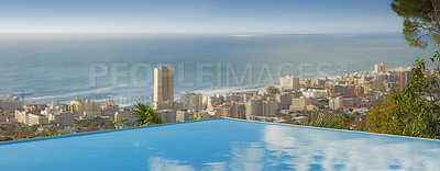 Buy stock photo Travel, ocean and infinity pool in city on vacation and hotel view in Cape Town with nobody, buildings and urban beach property. Cityscape, sea and sky at luxury accommodation for summer holiday trip