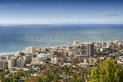 Buy stock photo City, ocean and urban buildings with architecture, infrastructure and development for property expansion. Skyline, metro cbd and outdoor with cityscape, skyscraper and sea with space in Cape Town