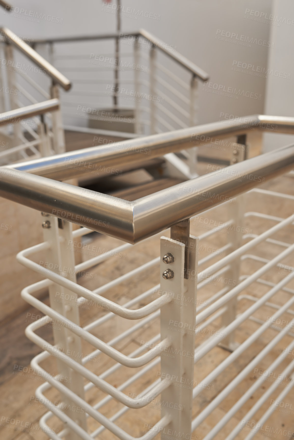 Buy stock photo Building, metal and railing on staircase interior for balance, aluminium and architecture. Construction, fence and balcony with handrail indoors for decoration, safety and banister design background