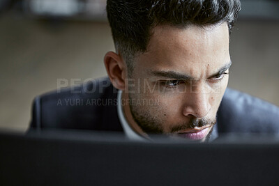 Buy stock photo Stressed businessman using a computer, trading on the stock market in a financial crisis. Trader working online in a bear market with stocks crashing. Market crash and economy depression or failure