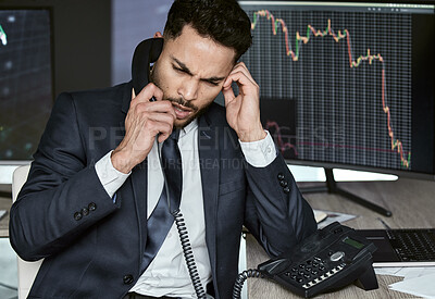 Buy stock photo Stressed businessman on the phone, trading on the stock market during a financial crisis. Trader in a bear market with stocks crashing. Market crash and economy depression or failure