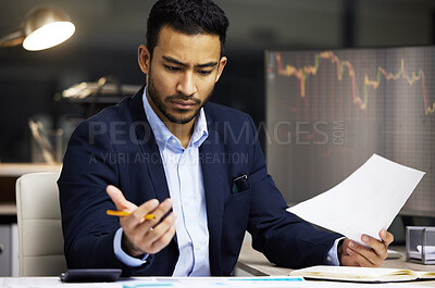 Buy stock photo Stressed businessman trading on the stock market in a financial crisis. Trader in a bear market with paper, looking at stocks crashing. Market crash, stock default and economy failure or depression