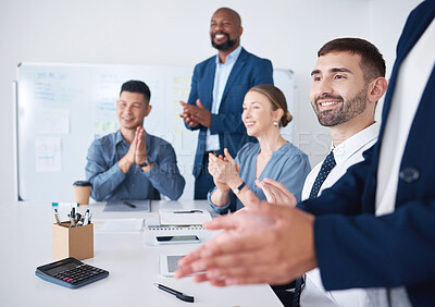 Buy stock photo Diverse group of smiling business people clapping during boardroom meeting in office. Happy team of male and female professionals celebrating success. Confident colleagues cheering after brainstorming