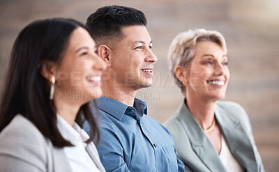 Buy stock photo Diverse group of smiling business people sitting together in office training. Happy team of colleagues using notebooks and technology while learning in a workshop. Attending a seminar for marketing