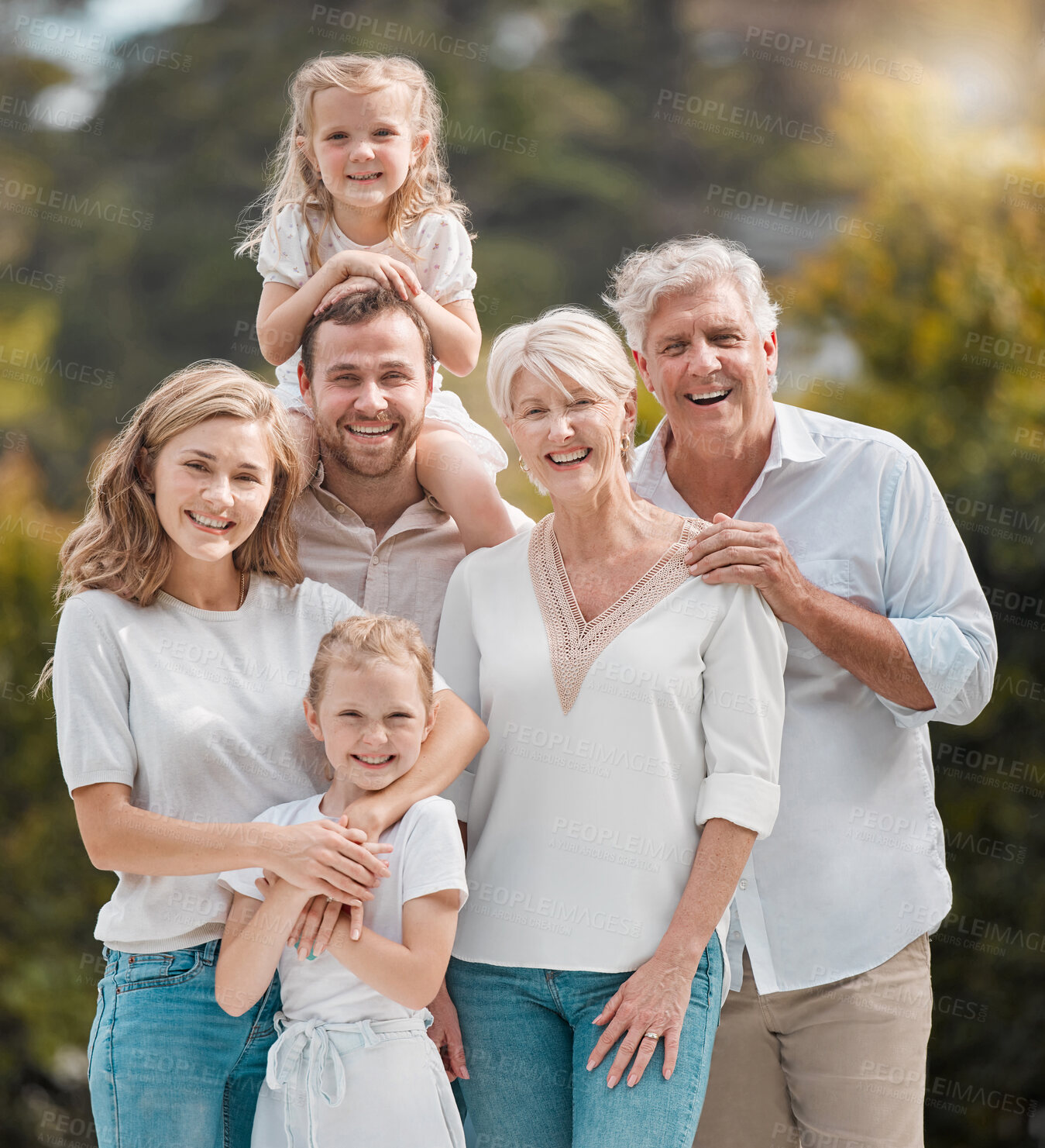 Buy stock photo Portrait of big family in backyard together with smile, grandparents and parents with kids in park. Nature, happiness and men, women and children in garden with love, support and outdoor bonding.