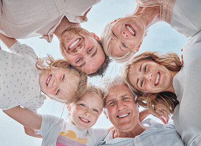 Buy stock photo Happy family, portrait and huddle for bonding together, parents and kids with pov, blue sky and outdoor. Holiday, carefree and grandparents with smile, childhood memories and cheerful for vacation

