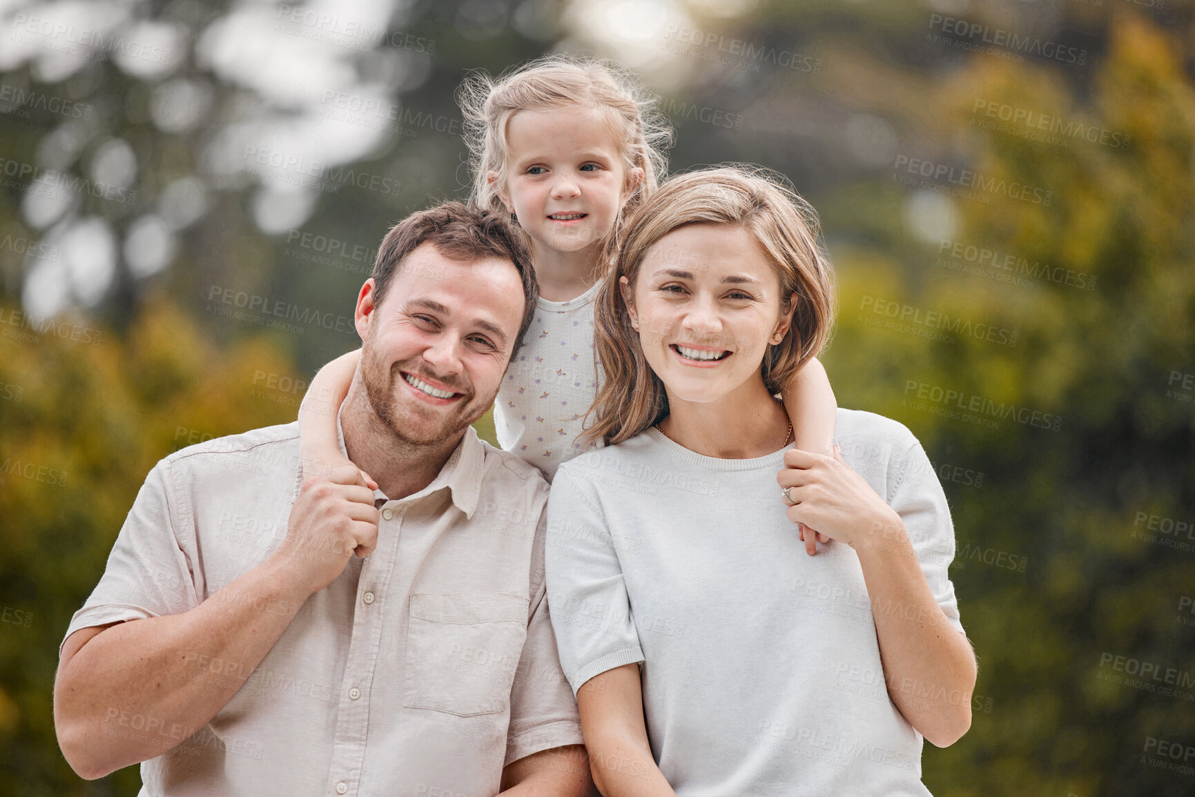 Buy stock photo Portrait of family in park, parents and child with smile, hug and mom, dad and girl in backyard. Nature, happiness and man, woman and kid in garden with love, support and outdoor bonding together.