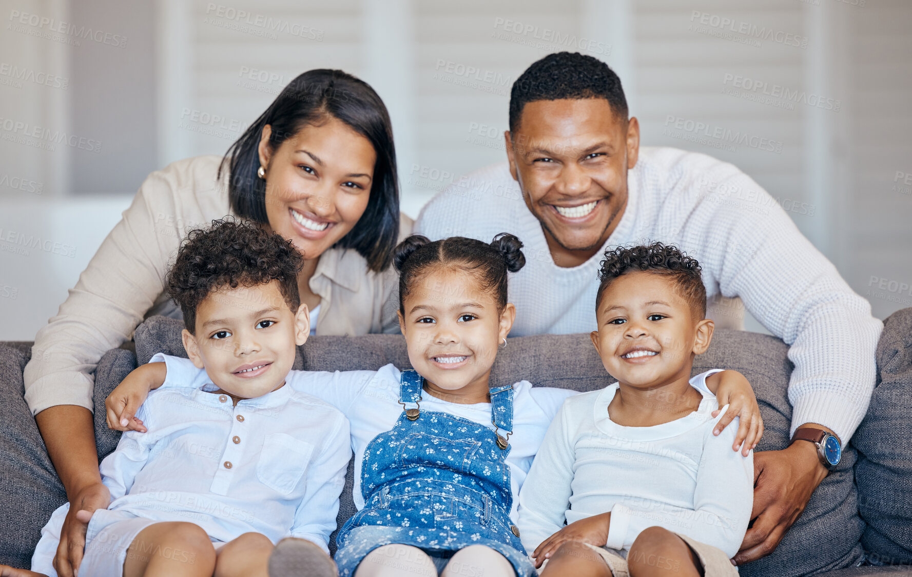 Buy stock photo Portrait, happy family and together with smile on couch for relaxing, peace and break in home. Parents, kids or siblings on sofa with love, care and trust in bond for childhood, memory or milestone