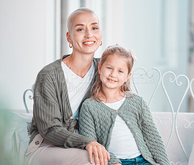 Buy stock photo Mother, girl kid and portrait on couch, smile and hug for care, love and bonding on vacation in family house. Mama, child and happy together for embrace with pride, relax and holiday at apartment