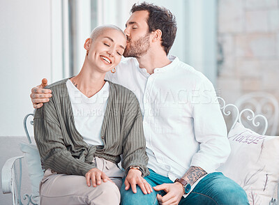 Buy stock photo Couple, hug and kiss on sofa with smile, care and bonding with love, memory and sitting in home living room. Man, woman and happy together with embrace on lounge couch, relax and pride in apartment