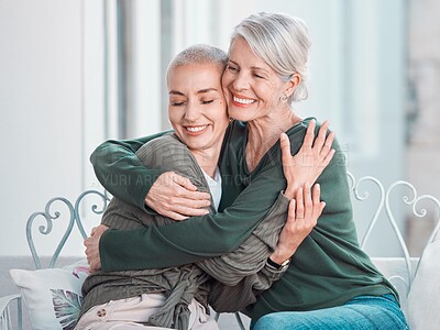 Buy stock photo Smile, hugging and senior mother with woman in the living room for bonding, love and care at home. Happy, sweet and elderly female person in retirement embracing adult daughter at house in Australia.