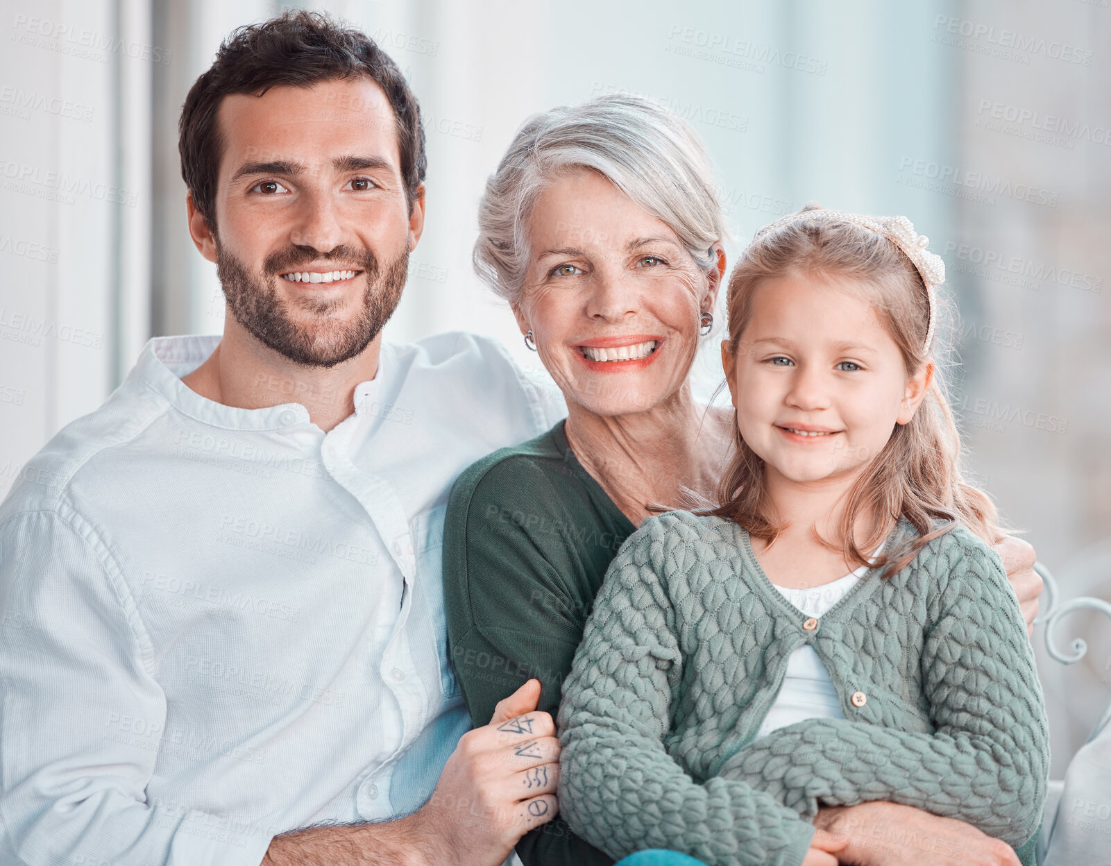 Buy stock photo Father, grandmother and girl with smile in portrait, hug and care with love, bonding and relax on chair. Dad, elderly woman and child with embrace, happy together and living room in family house