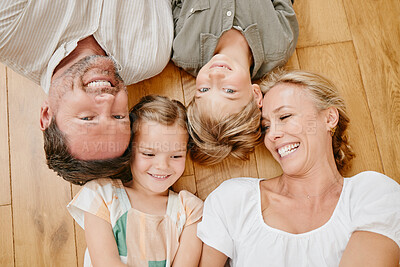 Buy stock photo Family, floor and above of parents and kids with smile for bonding, relationship and relax at home. Happy, laugh and top view of mother, father and children in living room for love, care or childhood