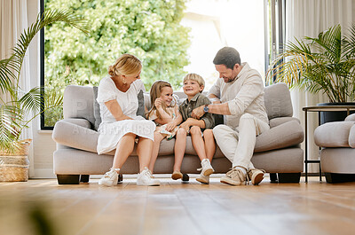 Buy stock photo Family, tickle and play on couch, laughing and bonding at home, fun and silly humor or comedy. Parents and children, connection and security in relationship, happy and care on sofa, love and goofy