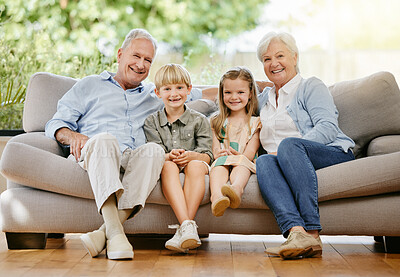 Buy stock photo Happy, portrait and children with grandparents on a sofa in the living room of modern family home. Smile, love and young kids sitting with grandfather and grandmother on couch in the lounge at house.