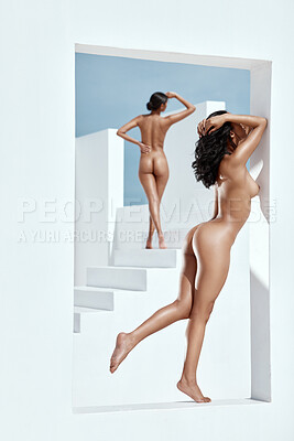 Full body of two unknown mixed race women standing outside together, posing nude on white stairs and against walls. Sexy hot hispanic models showing naked bodies. Sensual nudists seductive and free
